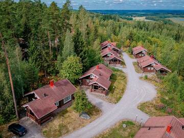 Фото номера Вилла с 3 спальнями Виллы Villa Kurpitsa at MESSILA ski &amp; camping г. Холлола 48