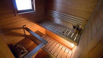 Фото номера Вилла с 3 спальнями Виллы Villa Kurpitsa at MESSILA ski &amp; camping г. Холлола 27